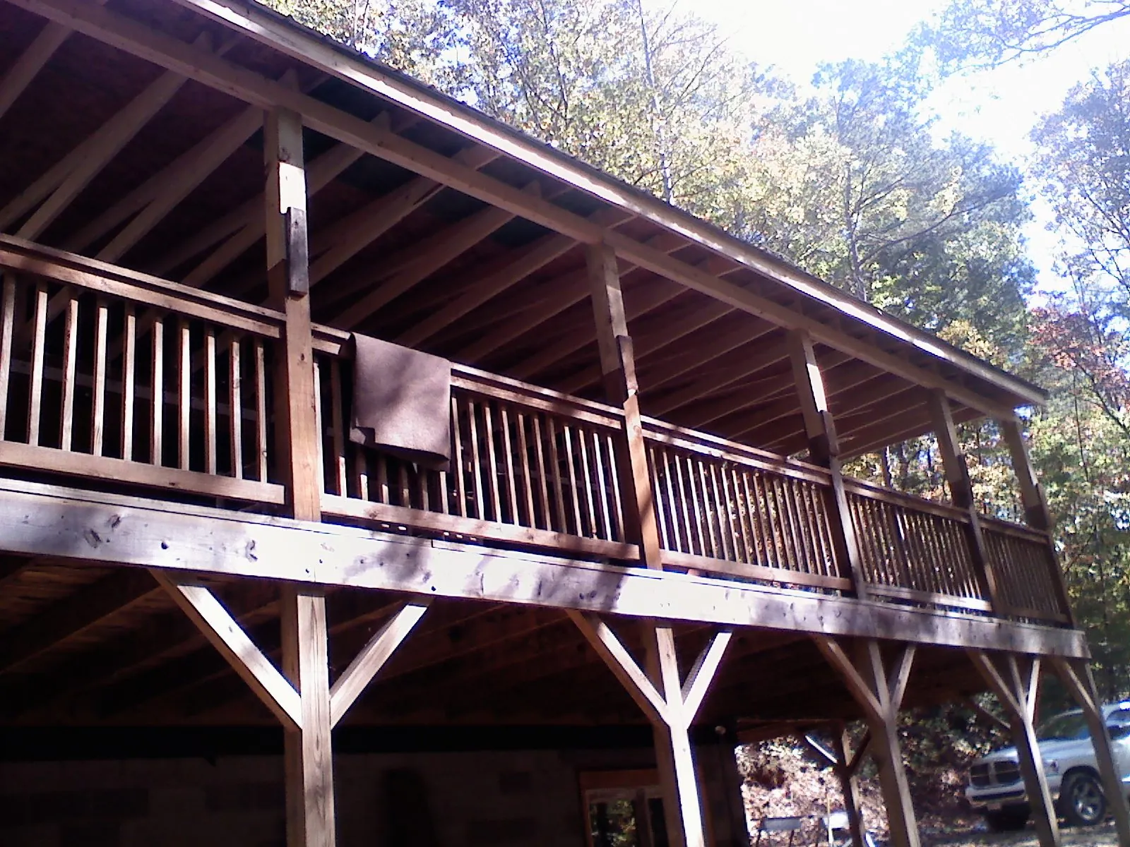 Timber framing under a new elevated porch and deck — Roof Leak Repair in Butner by Roofing Brothers
